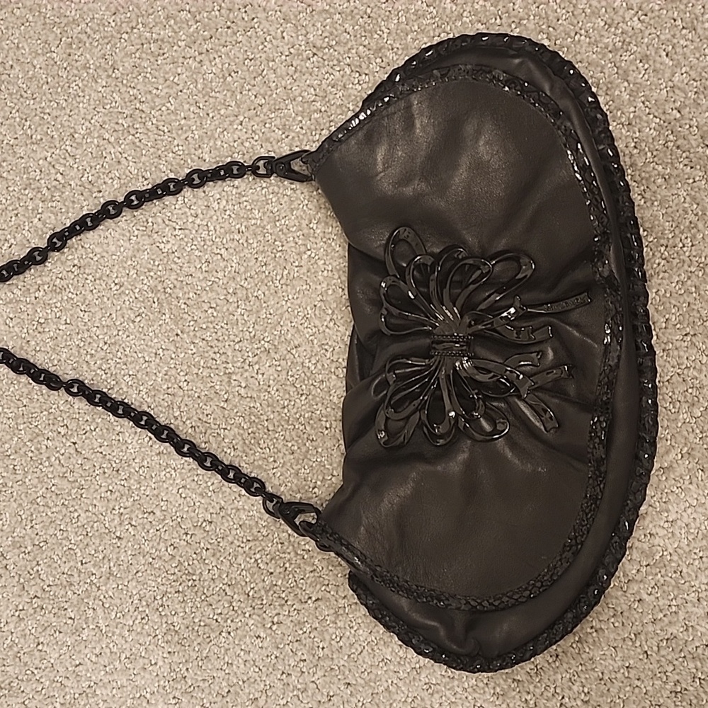 Betsy Johnson black leather clutch